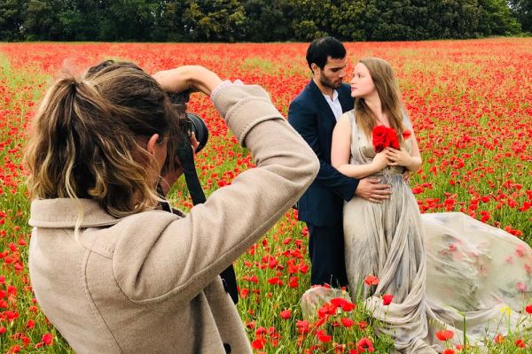 honeymoon couple romantic photograph with red poppies