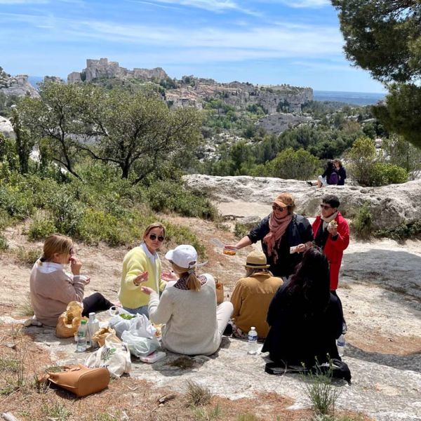 springtime in Provence small group tour on picnic with hilltop village view