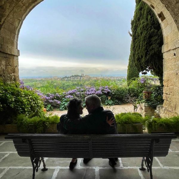 romantic couple on bench with view of Avignon in Provence, France