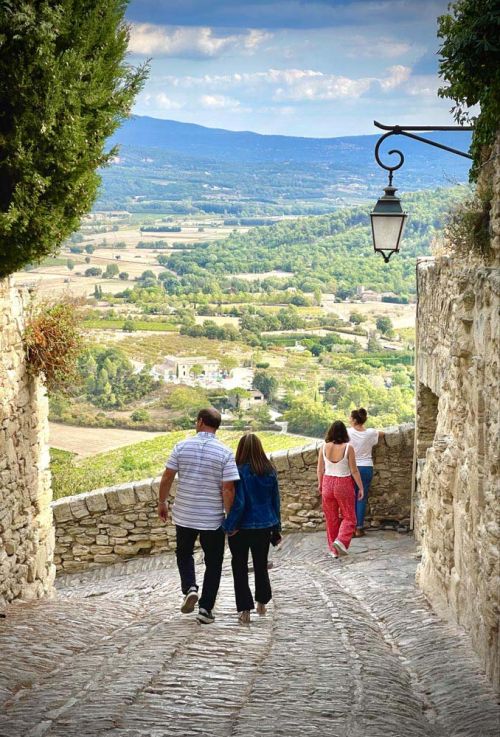 Gordes, France cobblestone walkway with valley view