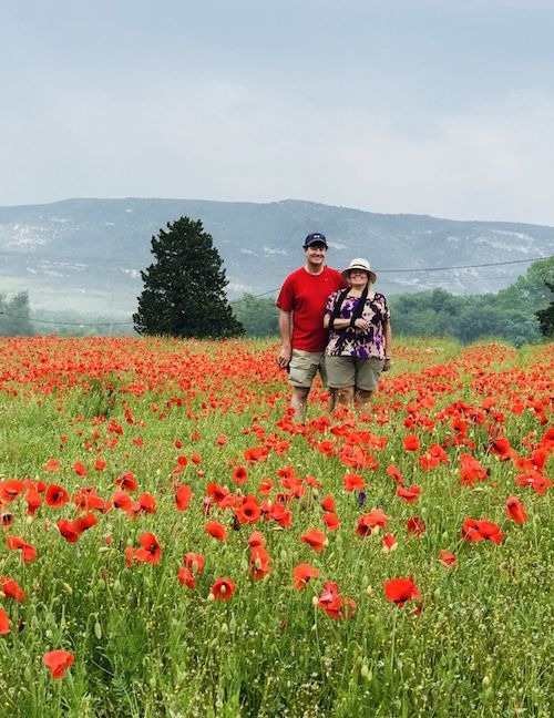 couple in poppy field on private four-day tour of Provence