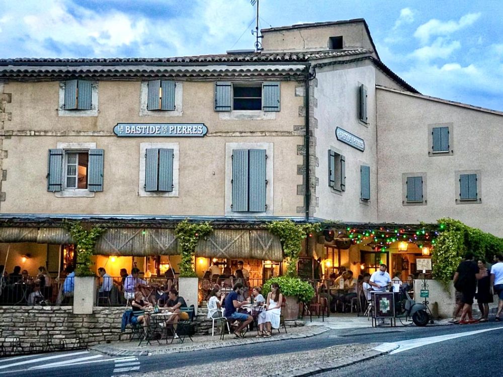 Gordes, France village restaurant in evening light is a fun Provence destination