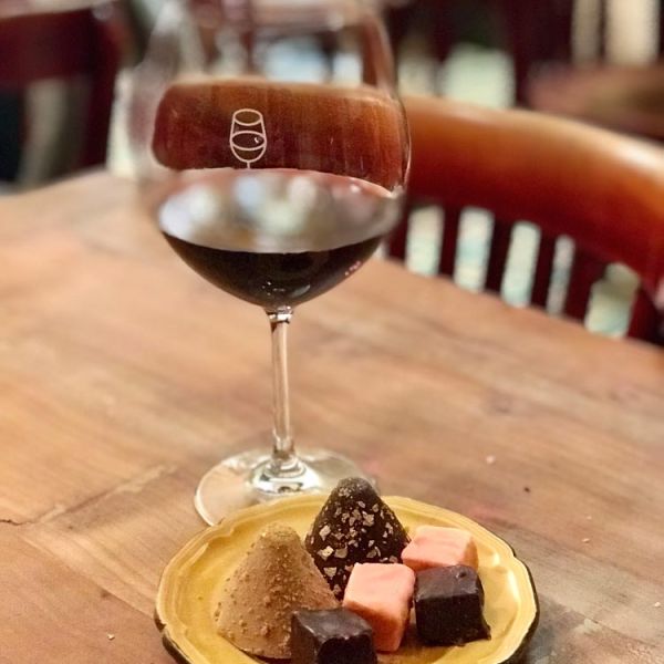 wine glass with chocolates